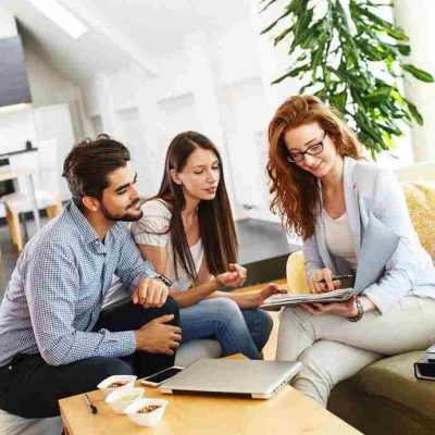 young-couple-sitting-with-METLIFE-Insurance-company-agent